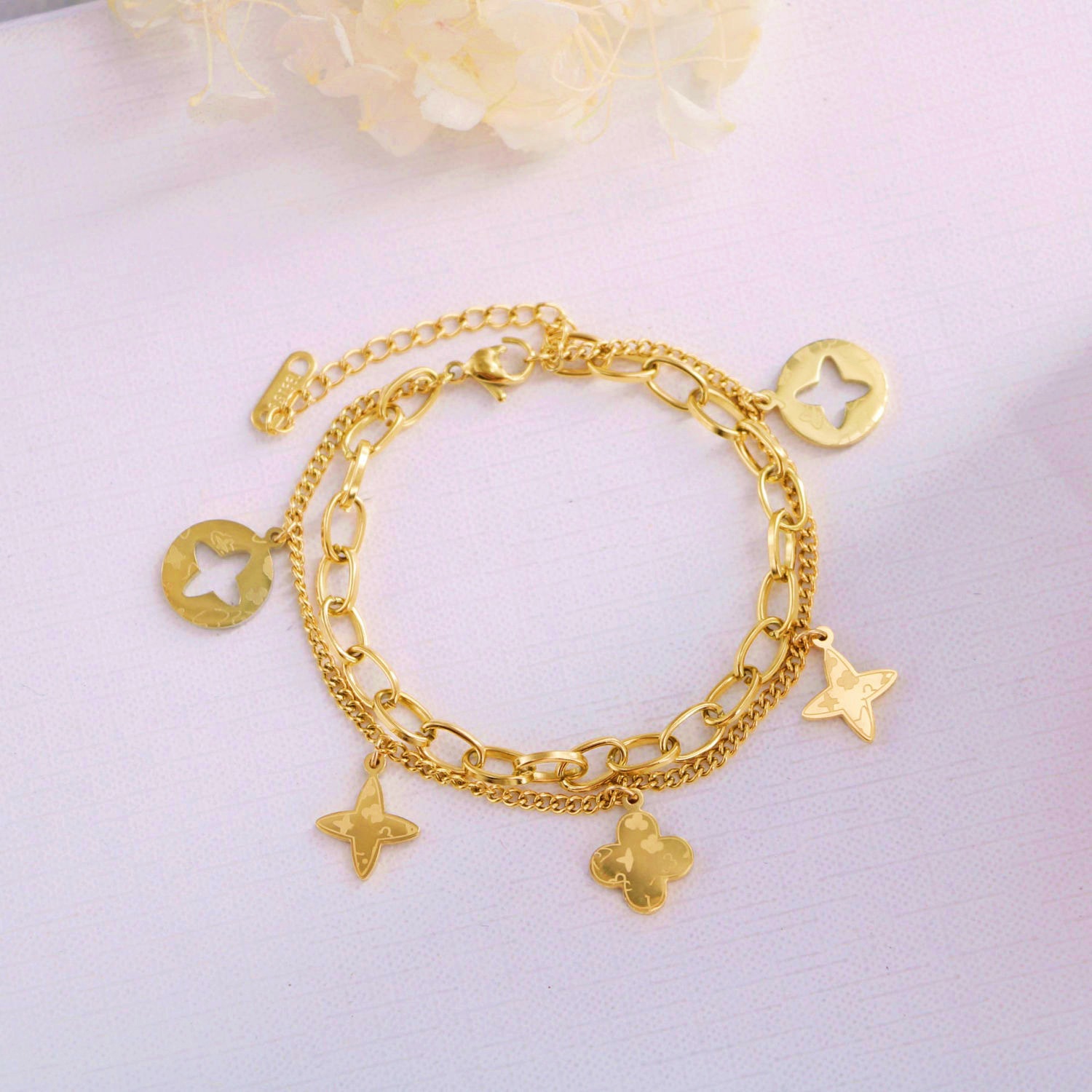High-grade Personality Golden Hollow-out Four-leaf Clover Tassel Bracelet Women's Color-free Japanese and Korean Fashion Prismatic Floret Bracelet