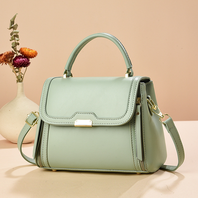 Bolso de mano bolso de comercio exterior de Taizhou bolso de mujer bolso de mensajero de un solo hombro de color sólido bolso de madre simple de moda de todo fósforo bags