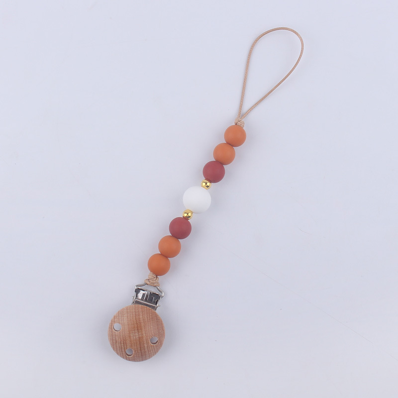 Nuevos suministros para bebés Beech clip calmante bebé DIY cuentas de silicona mordedura molar Cadena de pezón cadena anti-caída