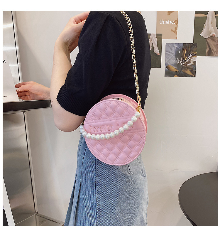 Fashion Solid Color Embossed Pearl Handle Small Round Bag display picture 4