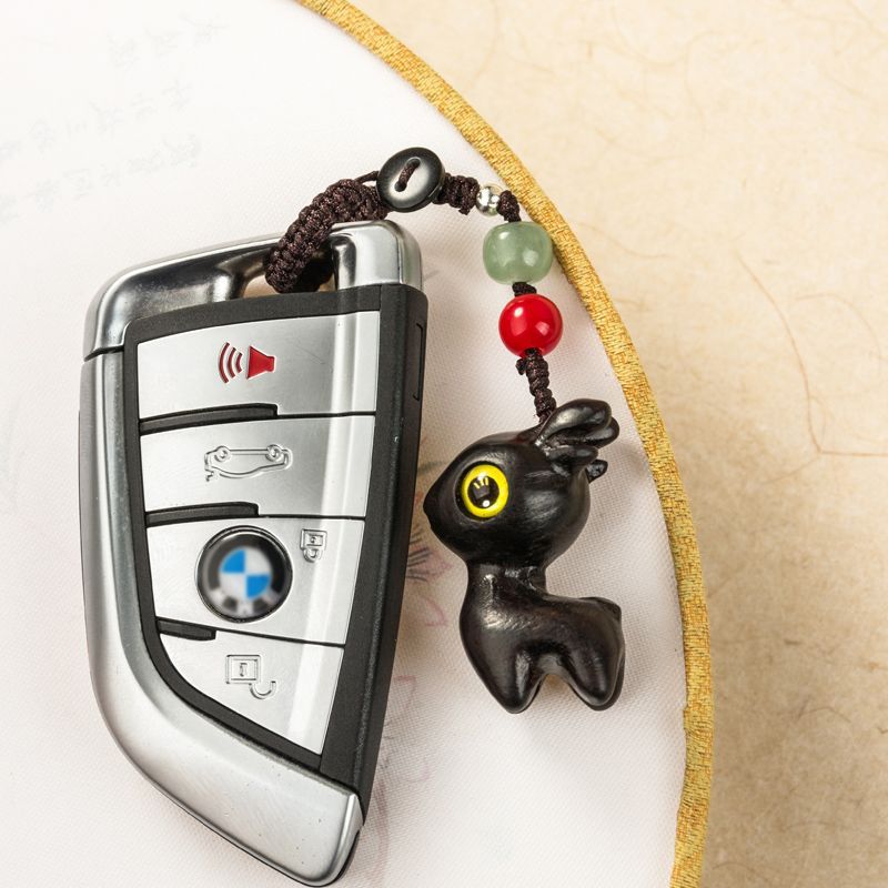 Portachiavi a forma di cervo in legno di sandalo, catena per auto intrecciata fatta a mano, ciondolo creativo per zaino, per uomini e donne, chiave di celebrità di Internet_voghion.com