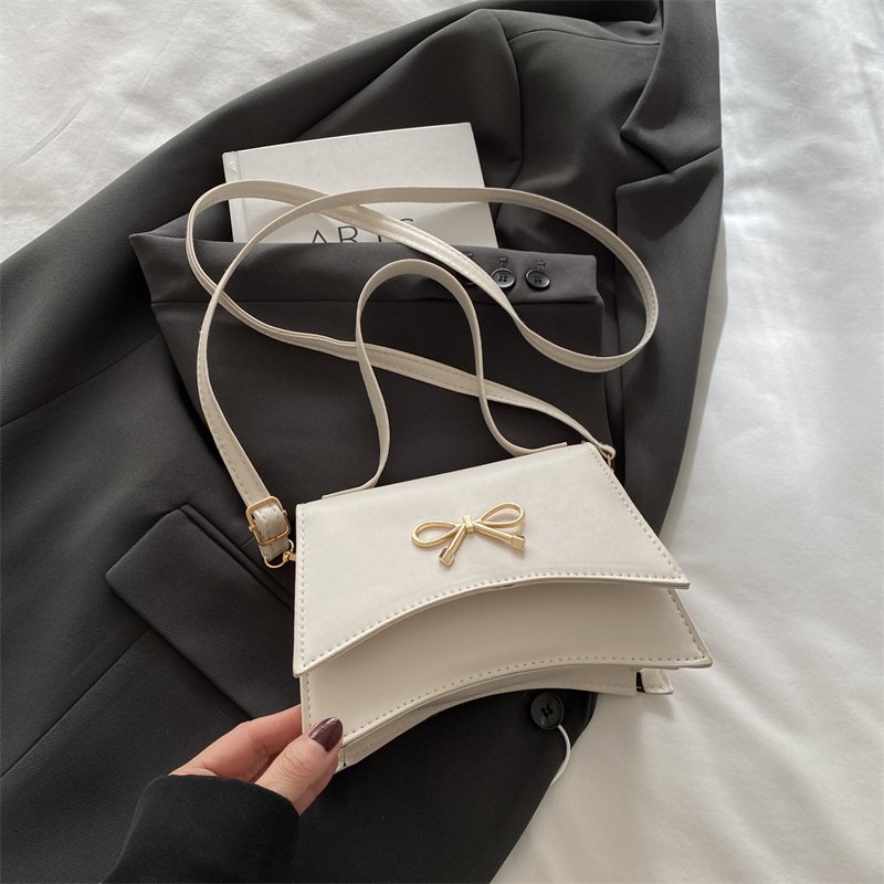 Nuevo diseño de nicho bowknot moda color sólido ins bandolera simple bandolera estilo occidental suave pequeño bolso cuadrado
