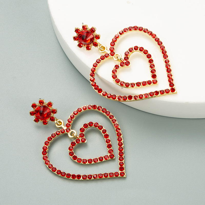 Creative Hollow Double Heart-shaped Earrings display picture 4