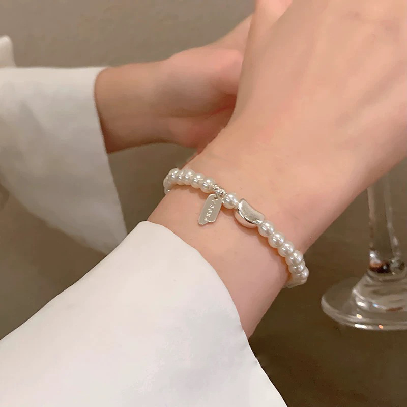 つや消しベビーブレスブレスレット女性用 2025 新しいライト高級ニッチ絶妙なリボン二層パールブレスレット|undefined