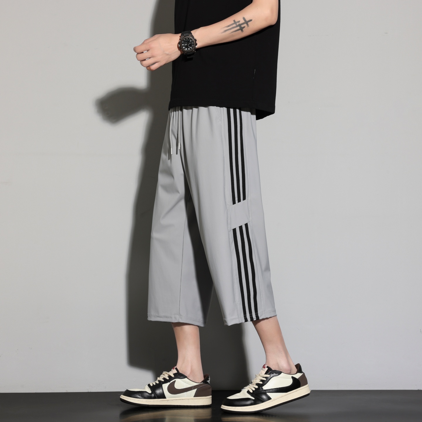 Pantalones de hielo para hombres de verano delgados deportivos de tres barras pantalones cortos gordo sueltos y pantalones casuales de hombre de tamaño grande