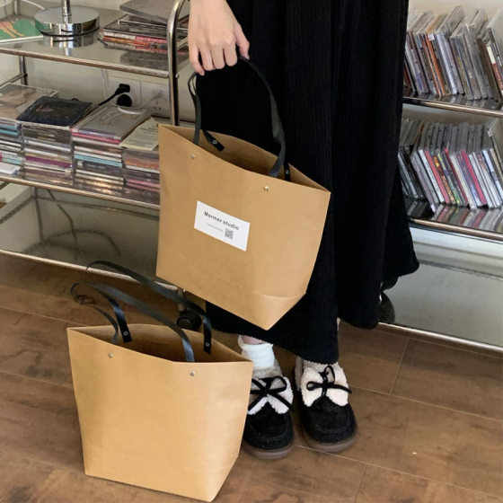 Kraft paper bag children's clothing store handbag clothing store non-side shopping bag simple paper bag hand bag in stock wholesale