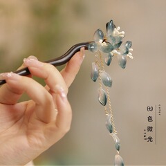 水墨の青い玉蘭の花のかんざしの新しい中国式の古風の木のかんざしは国風の高級感を出してかんざしの髪飾りの女性を飾ります。