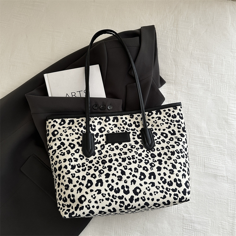 2024 en línea caño invierno nuevo retro leopardo bolso de lona bolso de hombro de niñas bolso de mano casual de gran capacidad