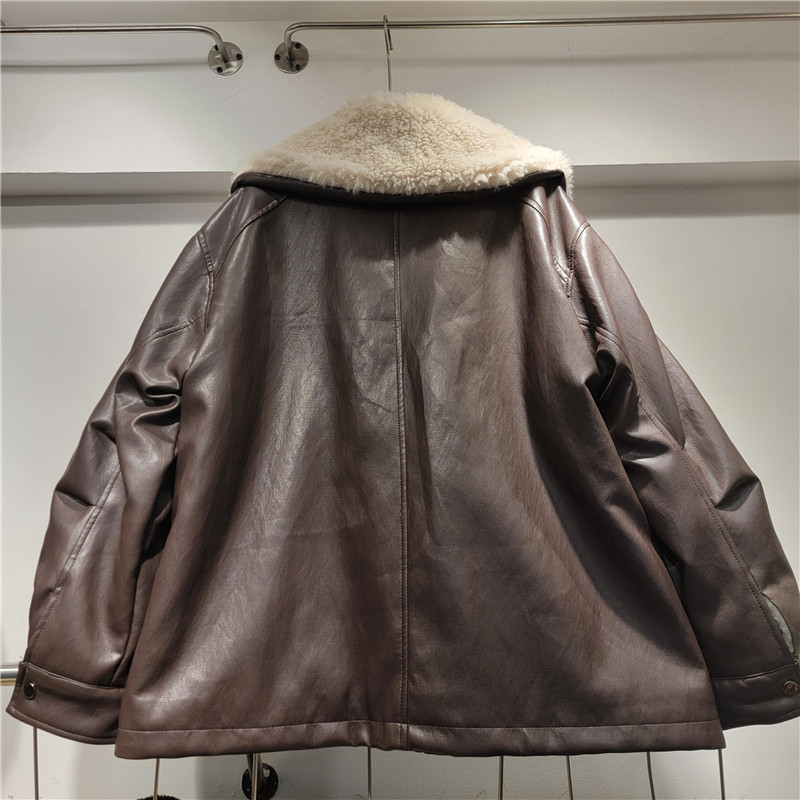 Cordero cosido gran chaqueta de cuero chaqueta de invierno de mujer nueva moda suelta con lana gruesa chaqueta de piel