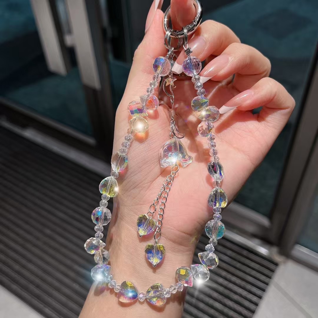 Cuerdas de muñeca corta de teléfono móvil cuerdas de muñeca personales creativas cuentas de diamante pequeños delfines hechos a mano perlas colgante lujoso ligero