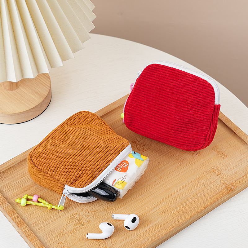 Nuevo bolso de cosméticos transfronterizo, bolso de almacenamiento de maquillaje de pana, monedero de estilo femenino, almacenamiento de toallas sanitarias, bolso portátil