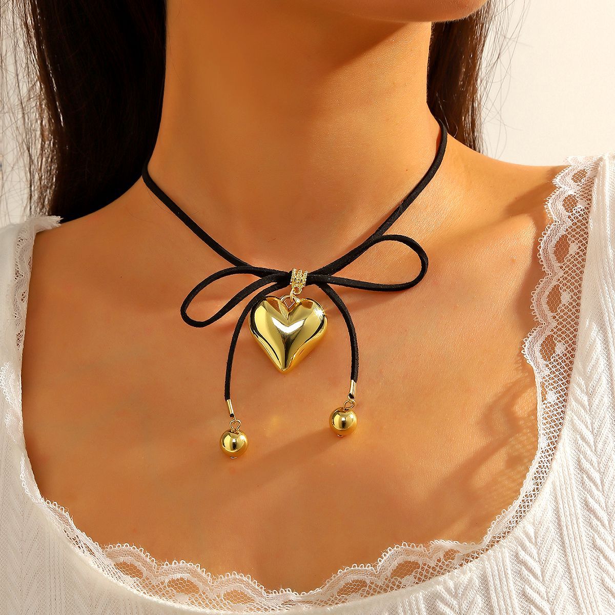 Collana con ciondolo a forma di cuore con fiocco nero, dolce e fresco, esagerata, con laccetto da collo, catena per clavicola._voghion.com