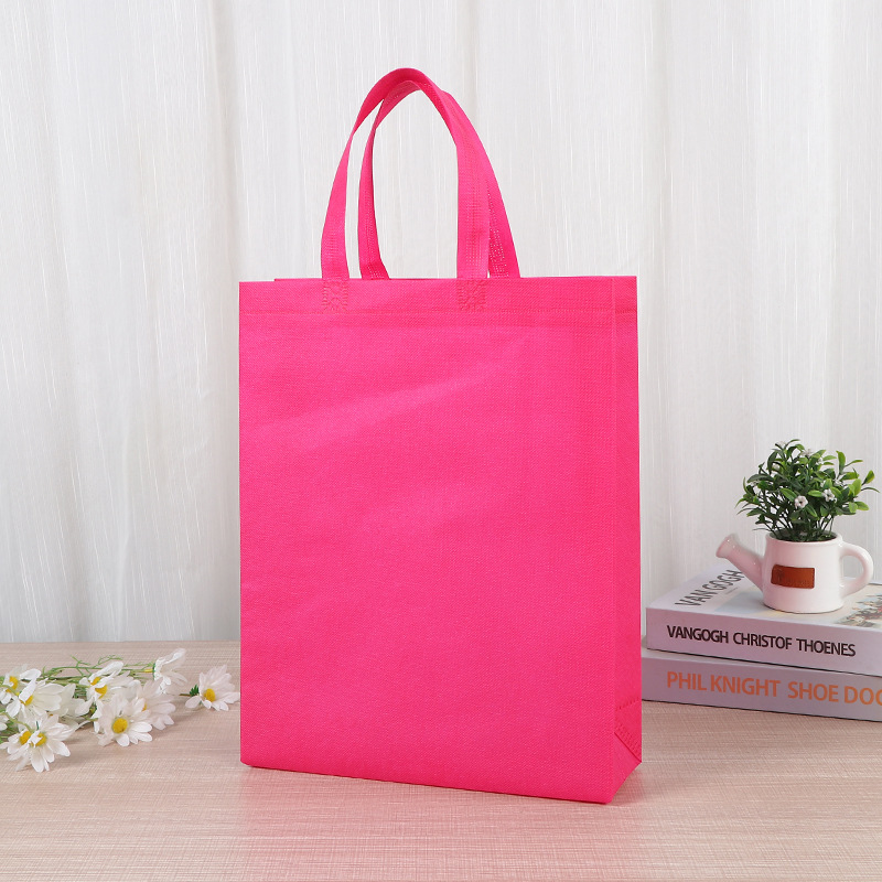 Bolsa de mano no tejida de color vertical en stock para aumentar el embalaje de regalo en blanco imprimible logotipo bolsas no tejidas