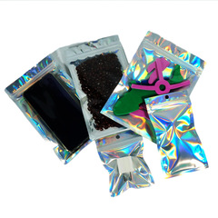 Laser-etched aluminum laminated self-sealing bags, holographic packaging bags, card holders, jewelry & accessory pouches, clothing bags, and gift bags