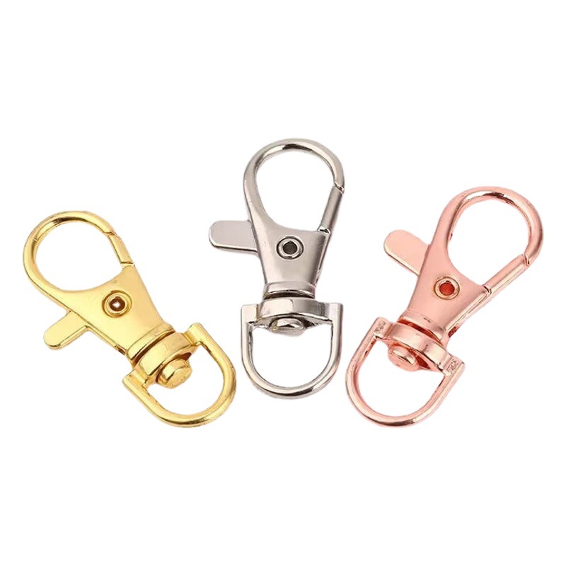 Hebilla de boca de pez de resorte al por mayor, accesorios de cadena de equipaje, hebilla colgante, hebilla de langosta de anillo c, llavero de acero inoxidable, hebilla de perro de aleación de zinc