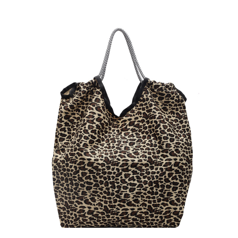 Versión coreana del bolso de tela con estampado de leopardo súper fuego, bolso de hombro de gran capacidad para mujer, bolso de compras, bolso portátil de moda