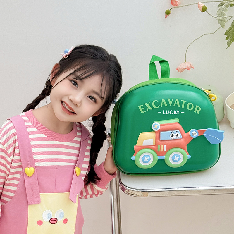 Cute jardín de infantes mochila de bebés excavadora de dibujos animados mochila para niños y niñas 2025 nueva mochila de cáscara de huevo para niños