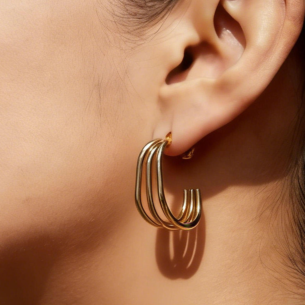 Alta Europa y América de moda auriculares de acero inoxidable ligero lujoso anillo de pigmentación chapado al vacío simple de alta calidad auriculares transfronterizos