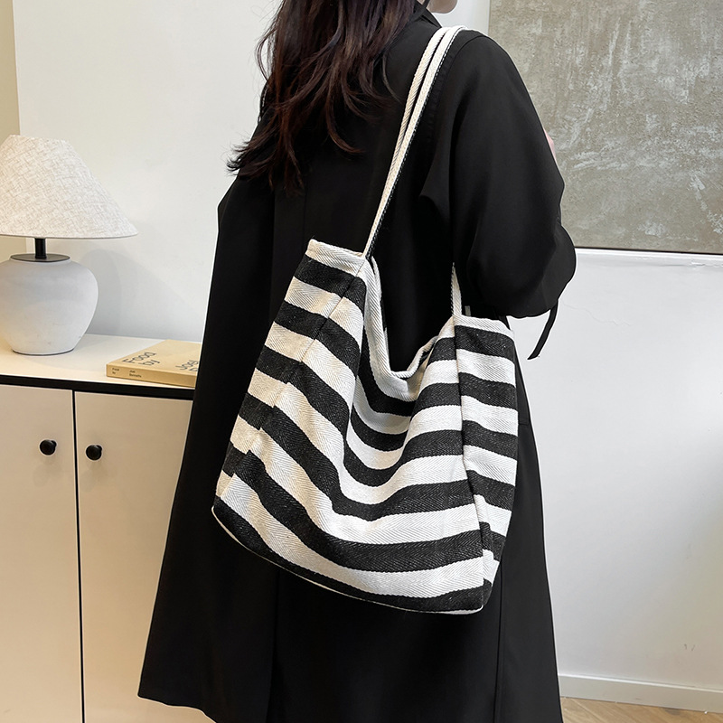 Corea del Sur ins bolsas de lona a rayas de color contraste bolsas de hombro de gran capacidad bolsas de compras de viento perezoso bolsas grandes