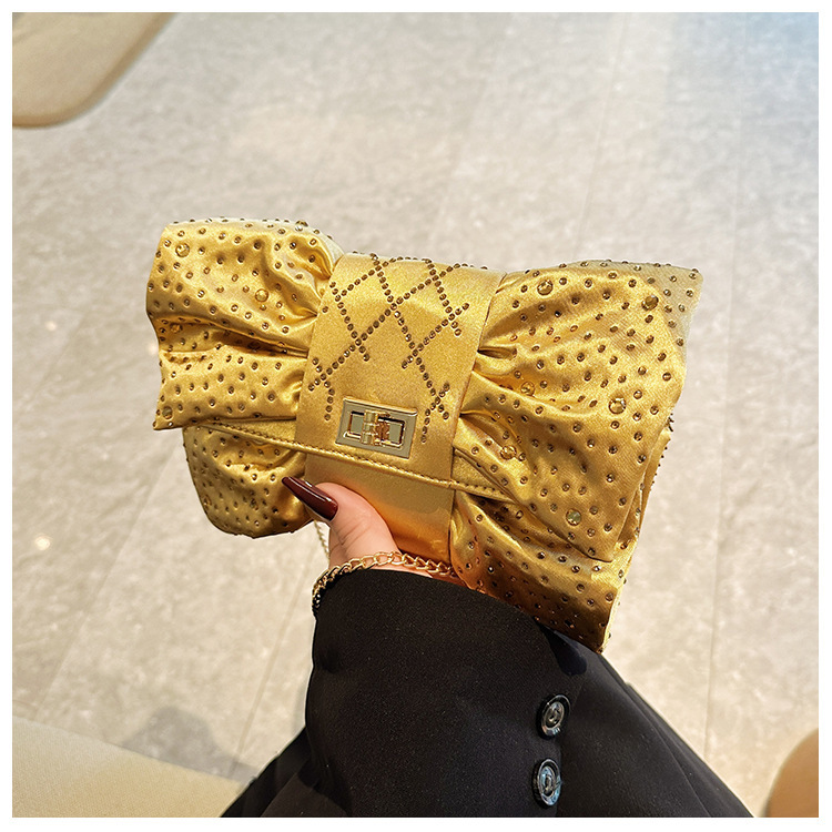 Paquete de cena de damas transfronterizas, paquete de fiesta de lujo ligero de diamante, paquete de cena de mano de arco de arco de oro de alto nivel