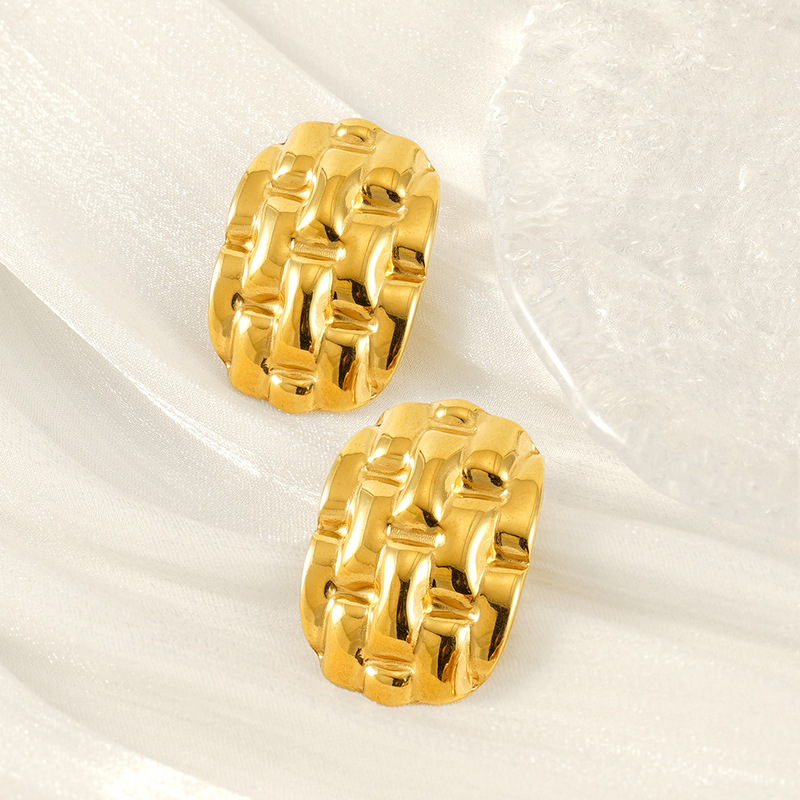 Pendientes de acero inoxidable dorado de 18k estilo INS europeo y americano Pendientes de raya geométrico giratorio en espiral al por mayor