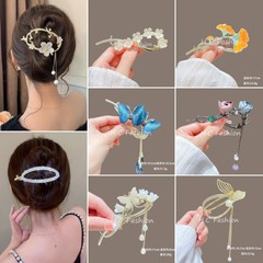 高級感の魚の尾のフリンジヘアは軽くて豪華な気質の蝶を挟みます。