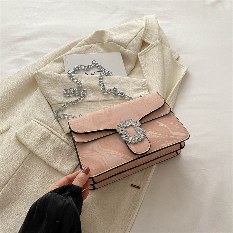 Moda simple temperamento coreano cadena de hombro bolso de mochila para mujeres 2024 primavera nueva bolsa de diamantes de estilo extranjero