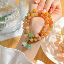 批发新疆金丝玉双圈手串铃兰花吊坠彩玉石景区寺院新爆款佛珠手链