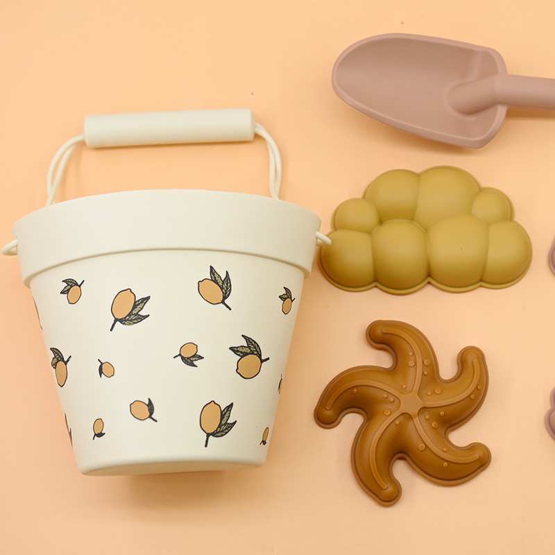 Juguetes de excavación de arena de playa para niños set de barril de silicona en stock mayorista limón transfronterizo espeso juguetes de playa de silicona