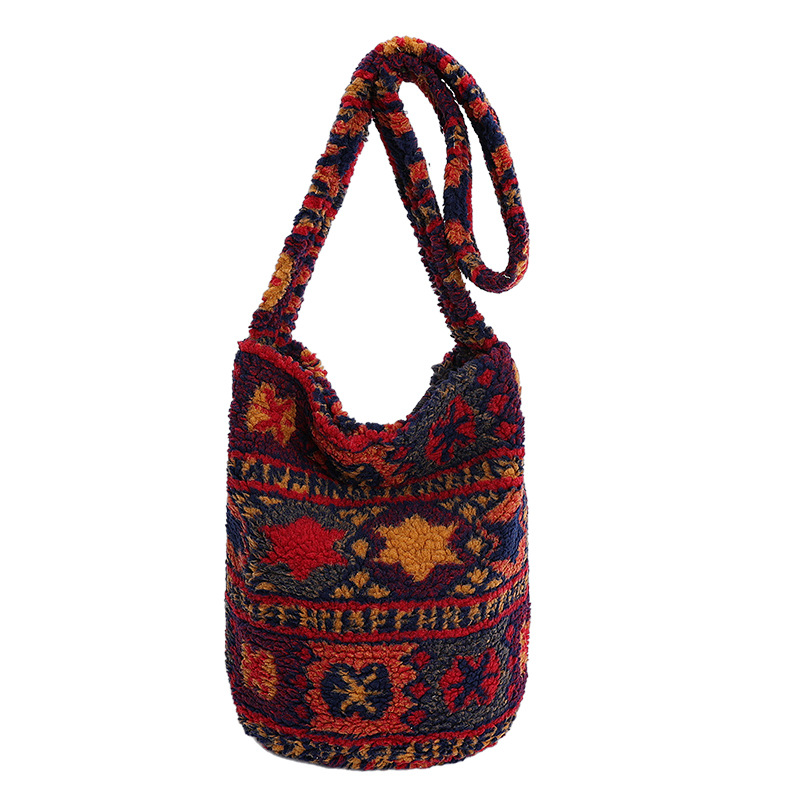 Otoño y invierno lindos bolsos de cordero para mujeres 2025 nueva moda flor bolsos de balde de gran capacidad bolsos de peluche