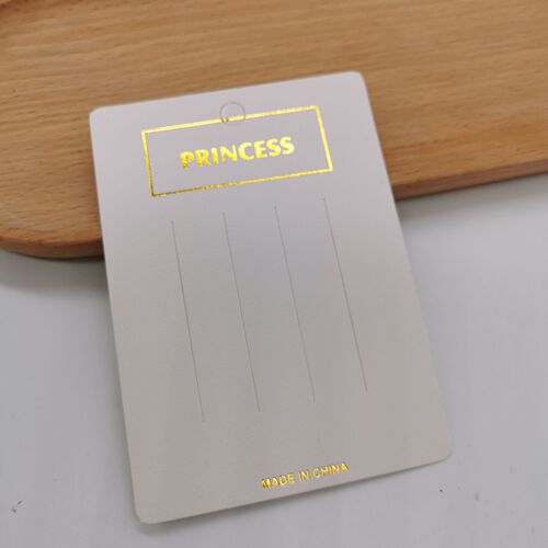 A pack of approximately 100 white hair clip earring ear stud cardboard hair tie necklace packaging card square card tag paper card