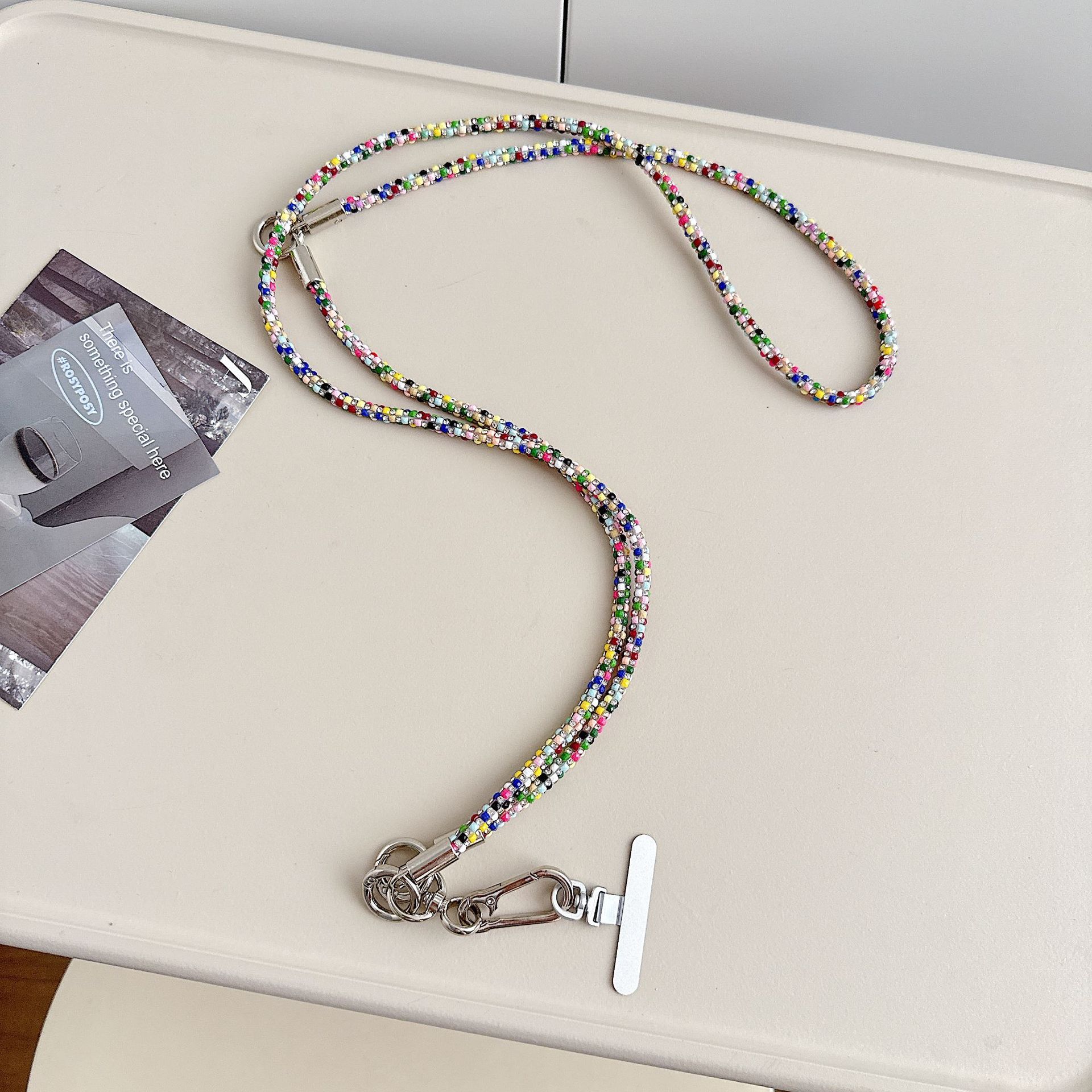 Cadena de teléfono móvil de alta gama hecha a mano de boutique, cordón de teléfono móvil de moda tres en uno de diamantes de lujo, mensajero largo/colgante