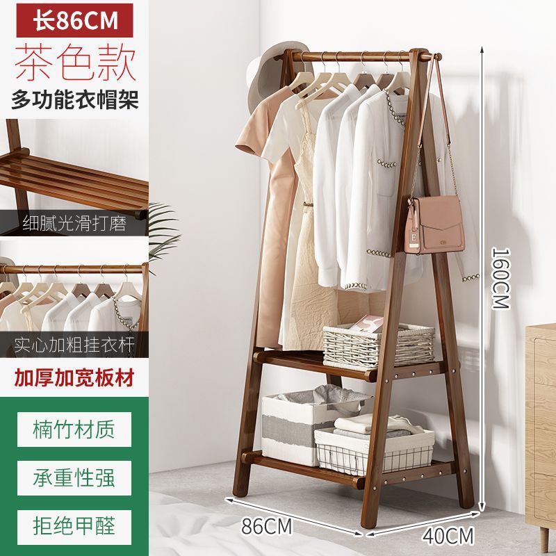 寝室の夜に寝て、ズボンを掛けてハンガーを収納します。