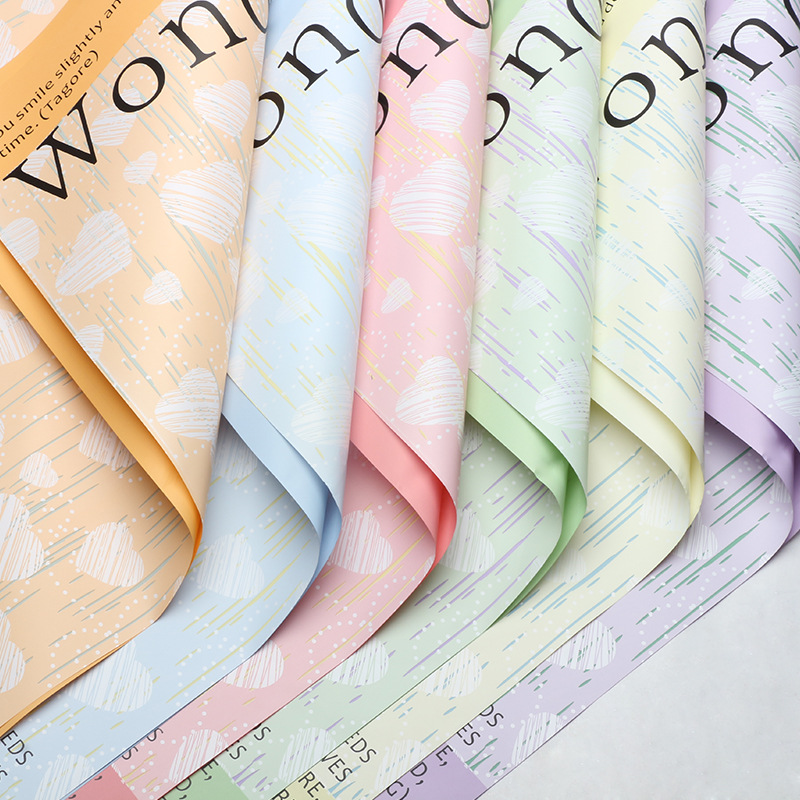 Huaxi en forma de corazón de azúcar comercio exterior transfronterizo papel de embalaje de flores pequeñas flores frescas regalo de papel de ramo de flores florista papel de embalaje de flores