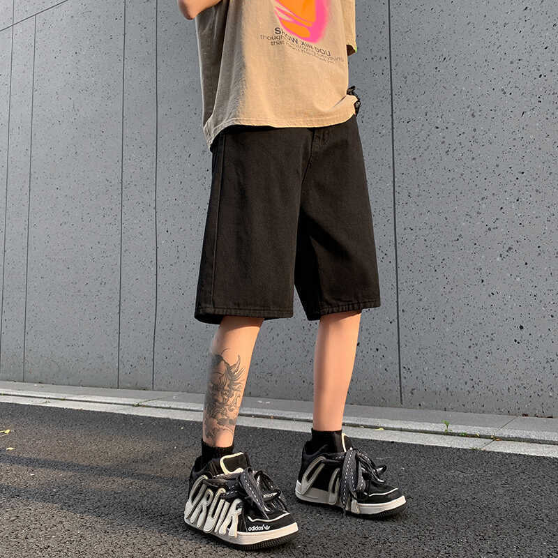 Pantaloncini di jeans casual estivi bianchi larghi 2024 nuovi pantaloni alla moda a cinque quarti con gamba dritta di media lunghezza per uomo_voghion.com