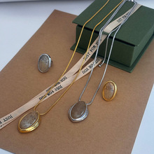 椭圆茶晶石吊坠抽拉项链法式小众天然戒指高级感S925银针简约耳钉