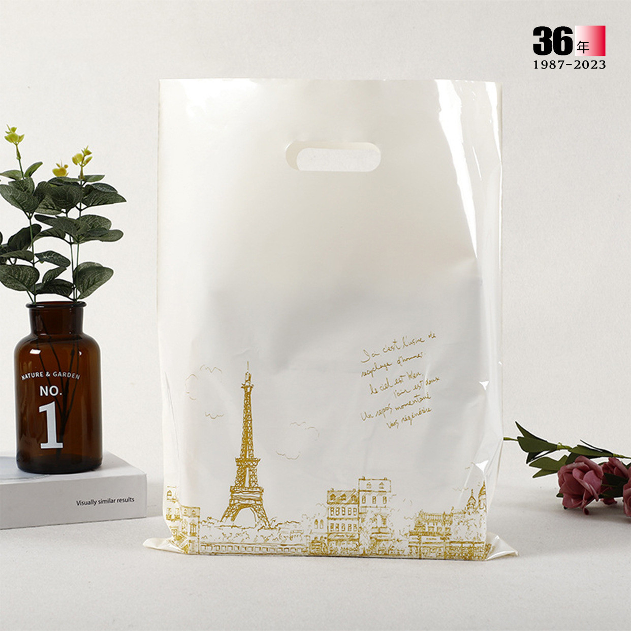 现货加厚冲孔手提袋子铁塔塑料袋服装店塑料袋广告袋购物袋加logo