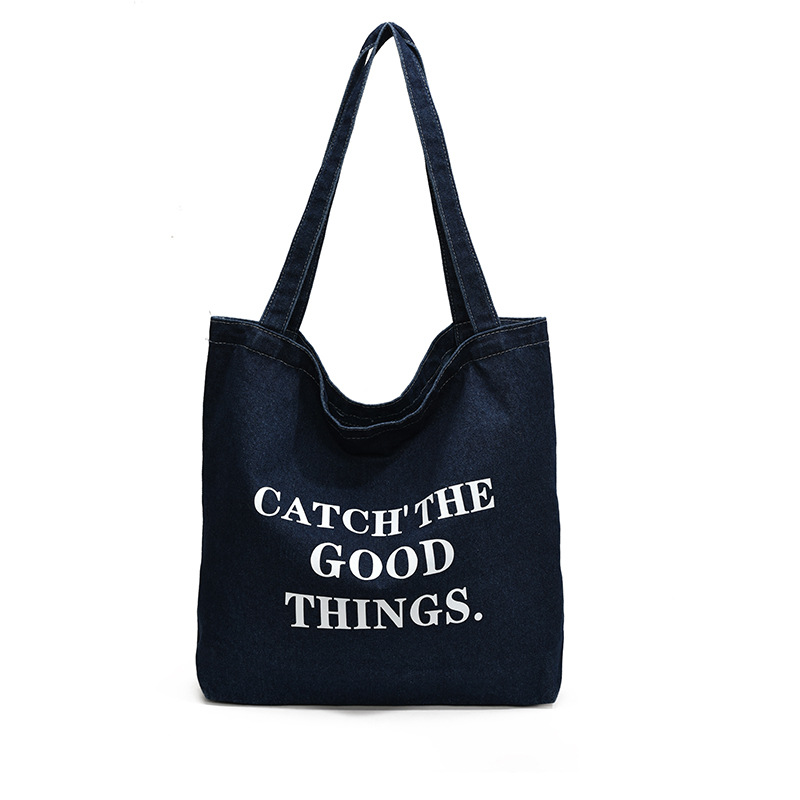 Bolsa de vaquín casual americana para estudiantes universitarios de clase viaje de compras letras de viento perezoso portátil gran capacidad bolso de hombro