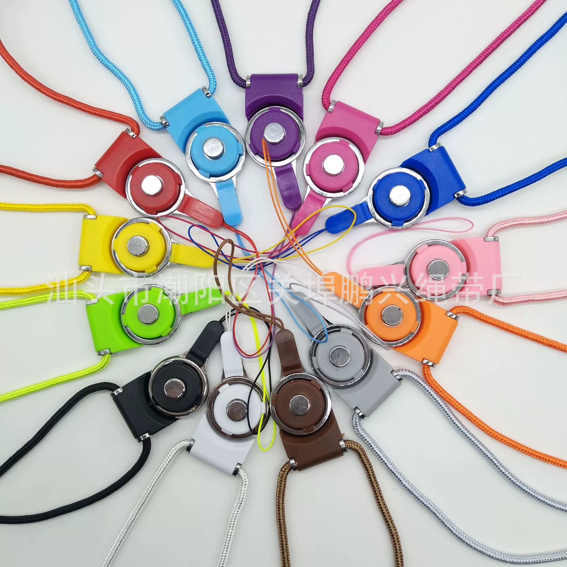 Шнур для мобильных телефонов можно разделить на длинный шнурк с вращающейся пряжкой