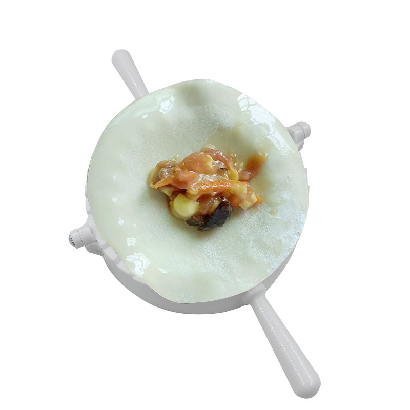 工場は餃子を作る金型をカスタマイズしてロゴを印刷することができます。|undefined