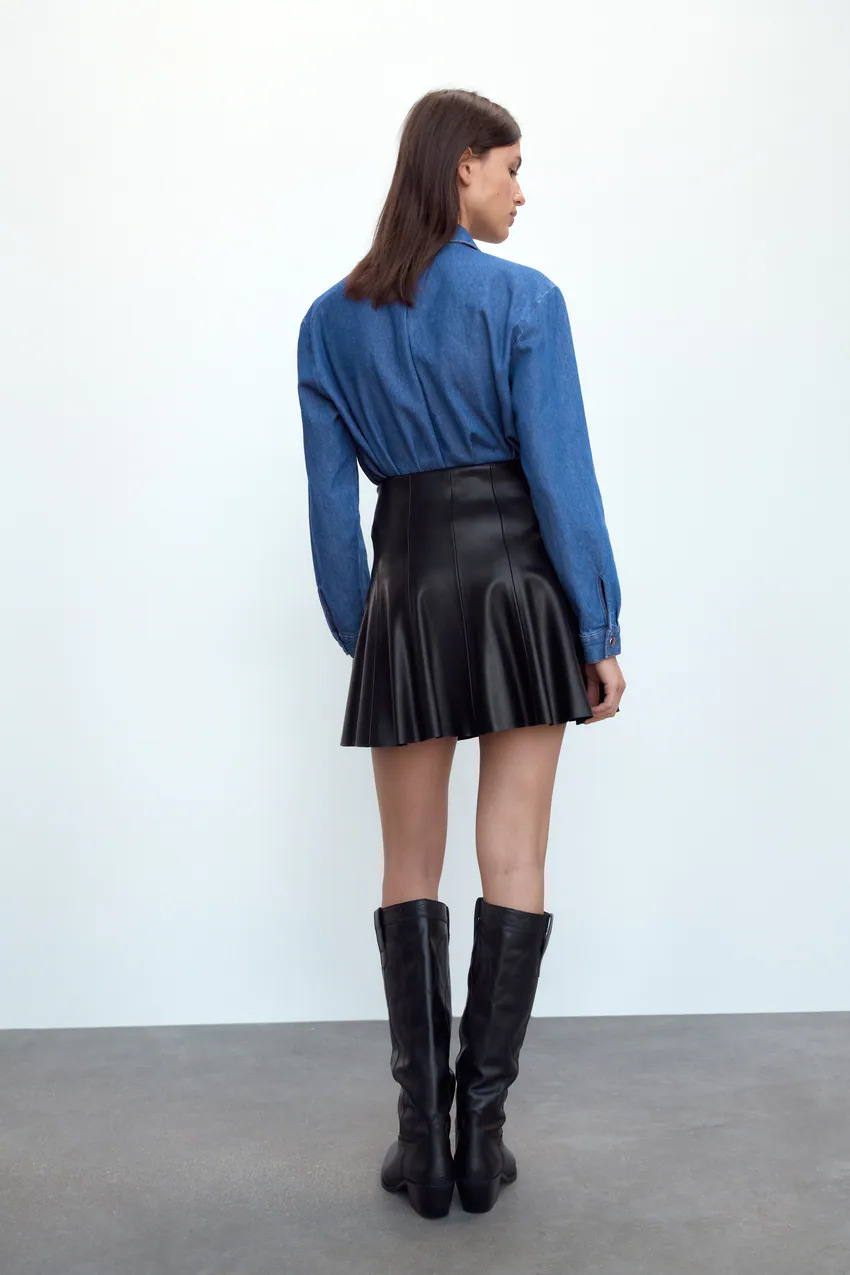 autumn imitation leather mini skirt nihaostyles wholesale clothing NSAM82977