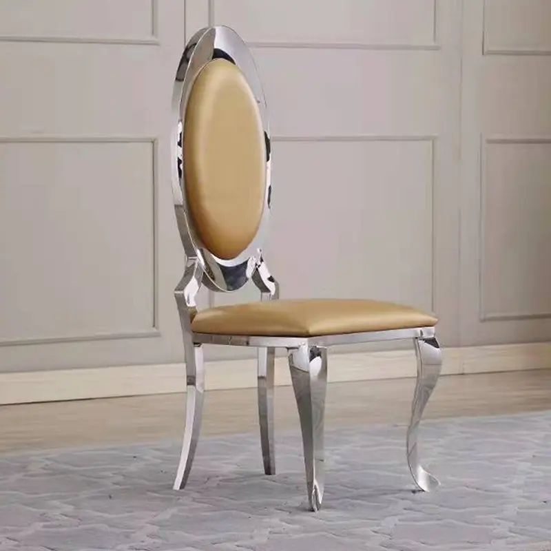 Sillas de comedor de acero inoxidable personalizadas lujo ligero de alta sensación de mesa de comedor silla transfronteriza silla dorada en el Medio Oriente