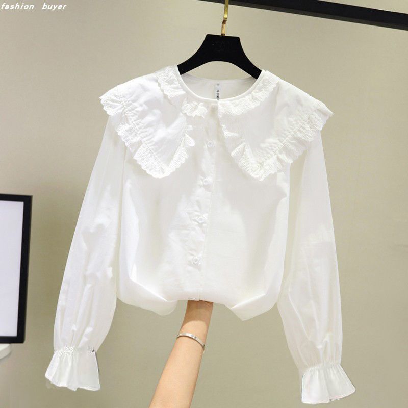 Camisa de primavera y verano para niñas 2023 nuevo estilo coreano estilo occidental camisa blanca de manga larga para niños collar de muñeca de encaje inferior superior