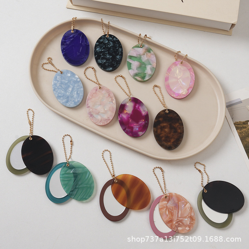 New oval mirror pendant with a high-end feel, suitable for bags and car keychains