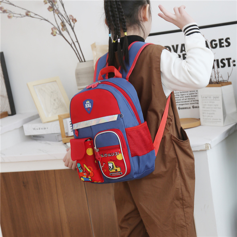 Comercio exterior nueva mochila de dibujos animados Grado 1-3 estudiante de la Escuela Primaria de gran capacidad de protección de la columna vertebral bolsa ultraligera