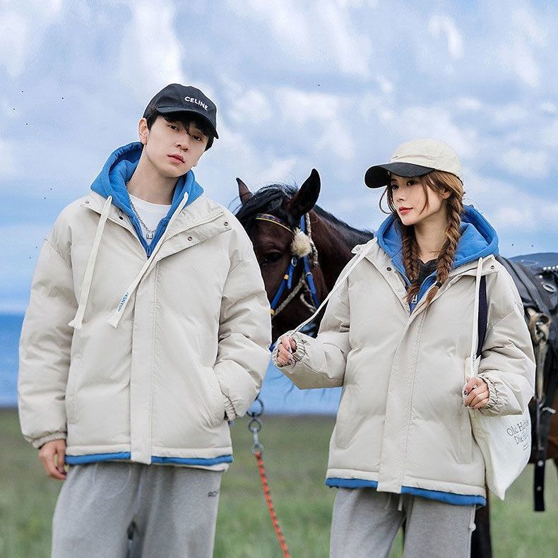 Abrigo acolchado de algodón para hombres invierno 2023 nuevo abrigo de pan con capucha de color sólido suelta pareja de moda falso Abrigo acolchado de algodón de dos piezas