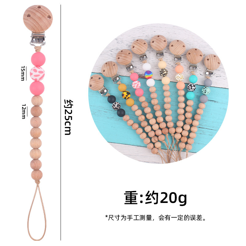 Nuevos suministros para bebés Beech chupete clip calmante bebé macaron cuentas impresas mordedura chupete cadena anti-caída de la cadena