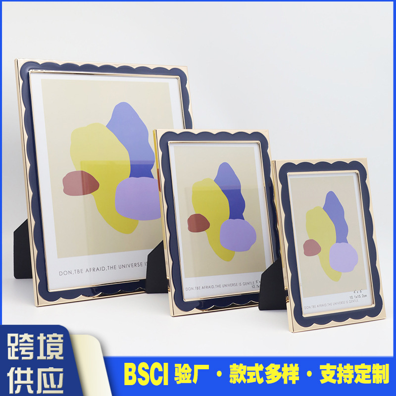 Cross-border hot sale Europe and the United States simple wavy drop glue metal photo frame home hotel decoration table in stock wholesale