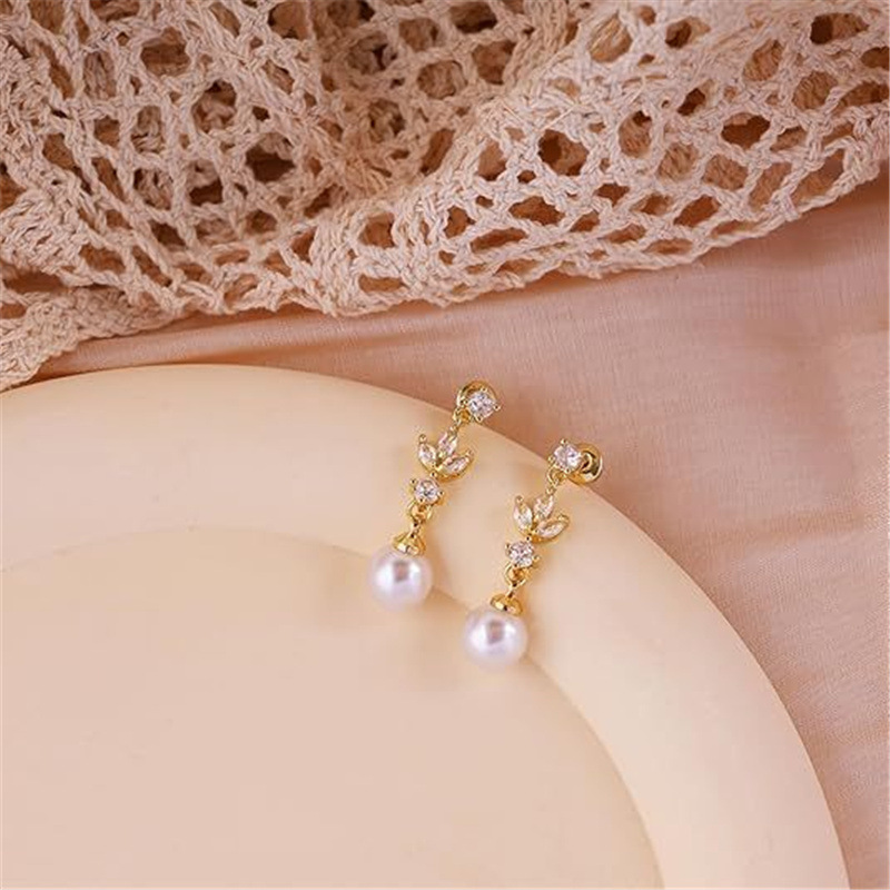 Geometría estética transfronteriza 2025 nuevo zircon de alta calidad perla hojas de aretes de gota de agua para mujeres moda aretes versátiles