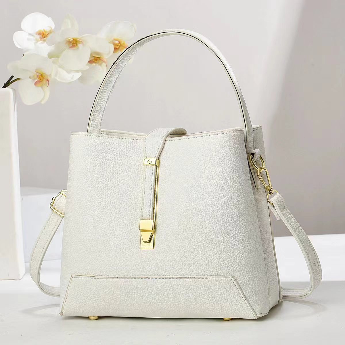 Fabricantes bolsos de comercio exterior mujeres 2025 nuevo bolsos de mano texturas coreanas de hombro único suave de moda de mujer